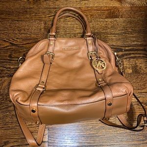 Michael Kors “bowling bag” shaped purse with handles and cross body strap